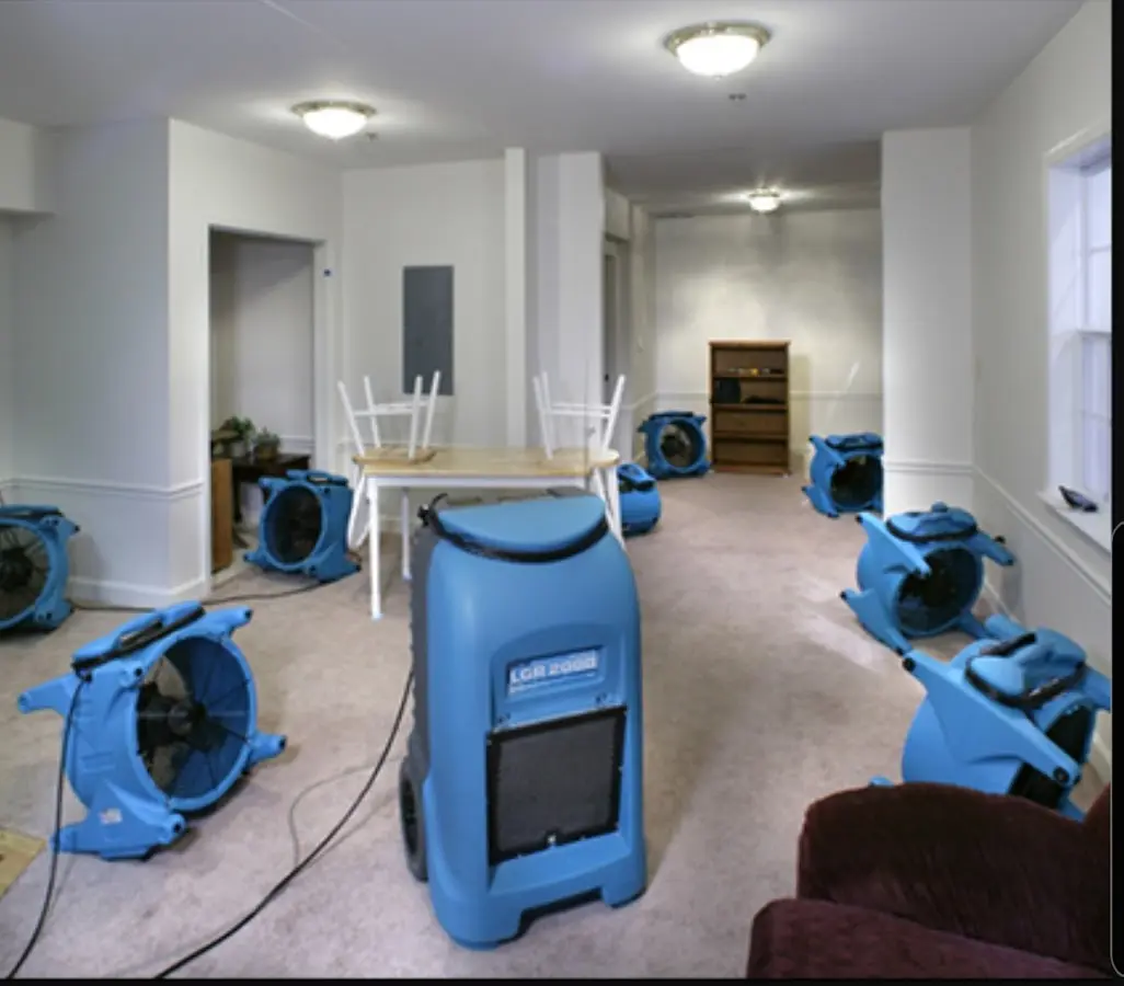 Air movers and dehumidifier setup for Water Damage Restoration in Beaumont